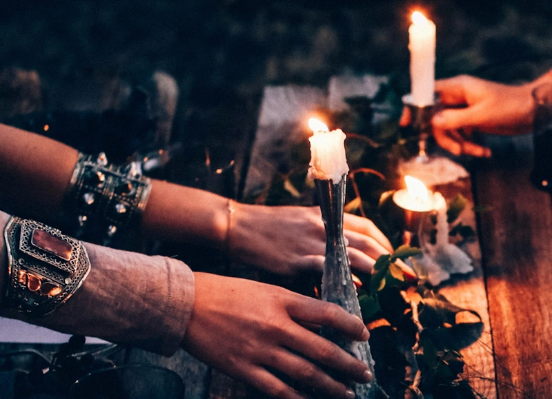 Mystical ritual with candles and ancient symbols